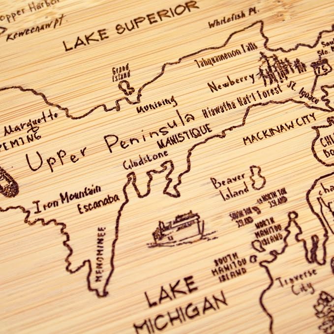 Totally Bamboo A Slice of Life Michigan Engraved Map Cutting Board | 11” x 8.75” charcuterie board with engraved state map artwork. Smooth reverse side for food prep. Hang tie for wall display.