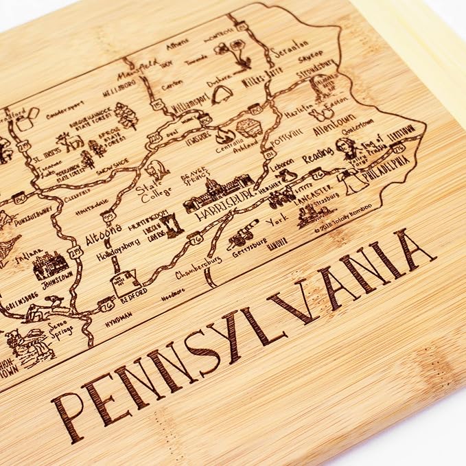 Totally Bamboo A Slice of Life Pennsylvania Engraved Map Cutting Board | 11” x 8.75” charcuterie board with engraved state map artwork. Smooth reverse side for food prep. Hang tie for wall display.