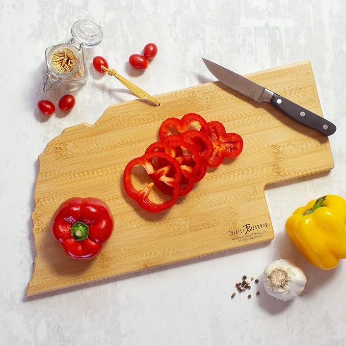 Totally Bamboo Nebraska State Shaped Cutting Board, Art by Fish Kiss | State charcuterie board with colorful hand-drawn map artwork. Smooth reverse side for food prep. Hang tie for wall display.