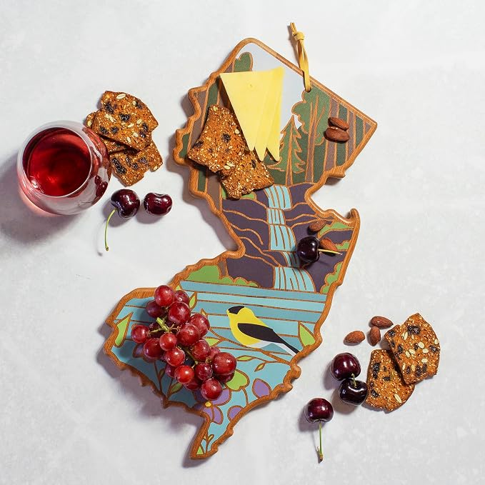 Totally Bamboo New Jersey State Shaped Cutting Board, Summer Stokes Art | State charcuterie board with colorful hand-drawn landscape art. Smooth reverse side for food prep. Hang tie for wall display.