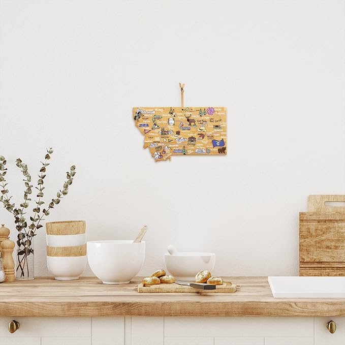 Totally Bamboo Montana State Shaped Cutting Board, Art by Fish Kiss | State charcuterie board with colorful hand-drawn map artwork. Smooth reverse side for food prep. Hang tie for wall display.