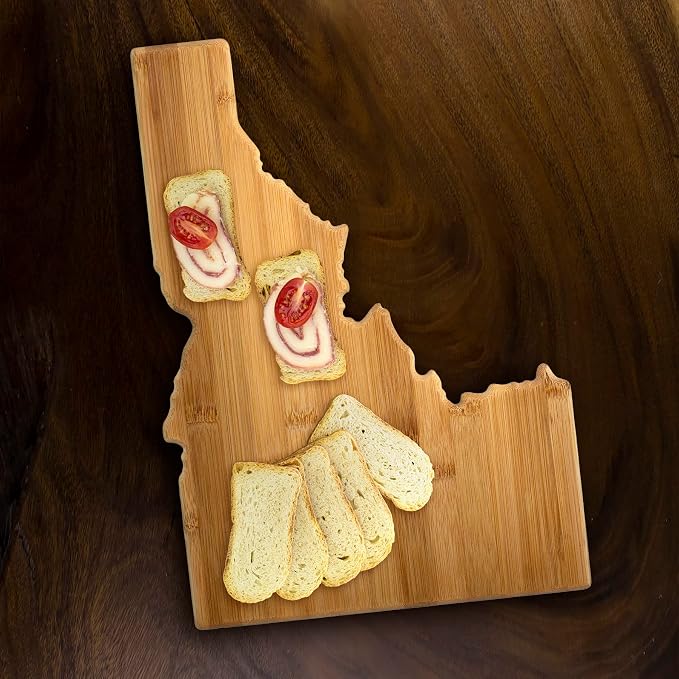 Totally Bamboo Idaho State Shaped Bamboo Serving and Cutting Board | State charcuterie board with natural bamboo grain. Knife-friendly surface for food prep. Hang tie for wall display.