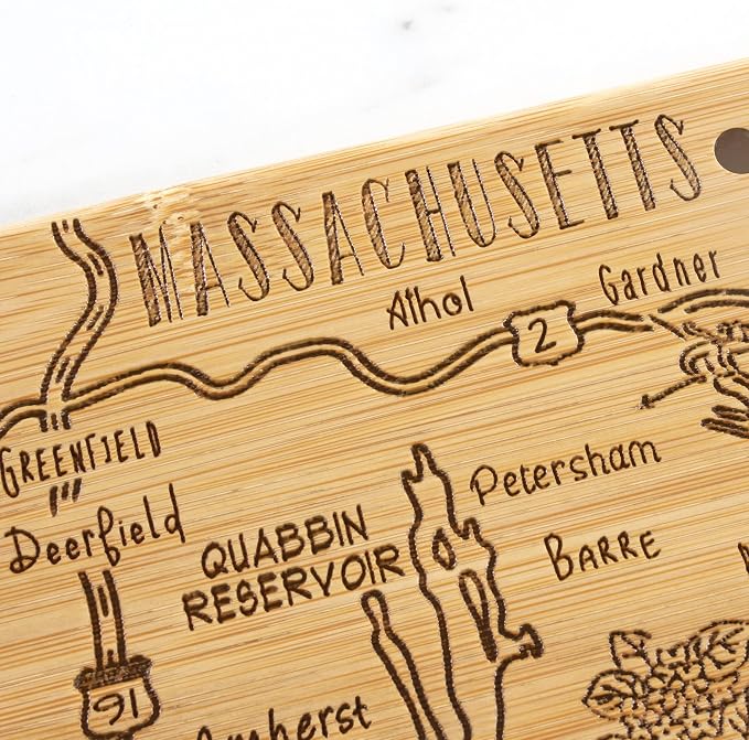 Totally Bamboo Destination Massachusetts State Shaped Cutting Board | State charcuterie serving board with engraved map artwork. Smooth reverse side for food prep. Hang tie for wall display.