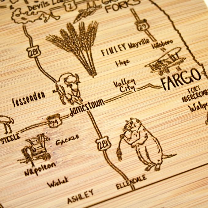 Totally Bamboo A Slice of Life North Dakota Engraved Map Cutting Board | 11” x 8.75” charcuterie board with engraved state map artwork. Smooth reverse side for food prep. Hang tie for wall display.