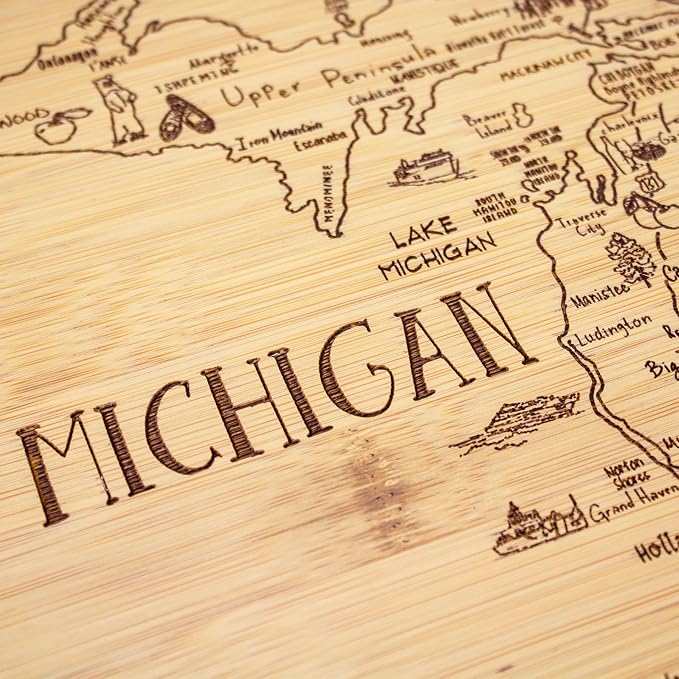 Totally Bamboo A Slice of Life Michigan Engraved Map Cutting Board | 11” x 8.75” charcuterie board with engraved state map artwork. Smooth reverse side for food prep. Hang tie for wall display.