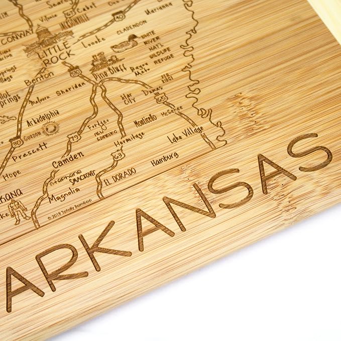 Totally Bamboo A Slice of Life Arkansas Engraved Map Cutting Board | 11” x 8.75” charcuterie board with engraved state map artwork. Smooth reverse side for food prep. Hang tie for wall display.