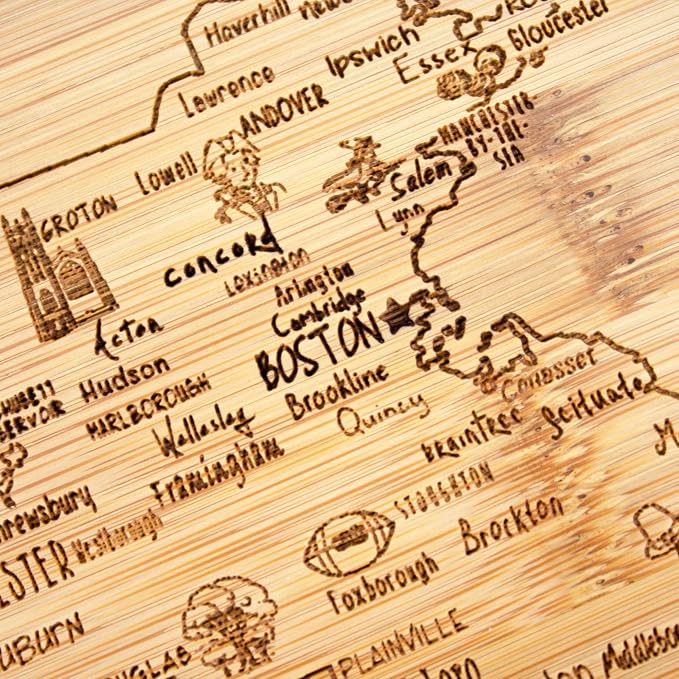 Totally Bamboo A Slice of Life Massachusetts Engraved Map Cutting Board | 11” x 8.75” charcuterie board with engraved state map artwork. Smooth reverse side for food prep. Hang tie for wall display.