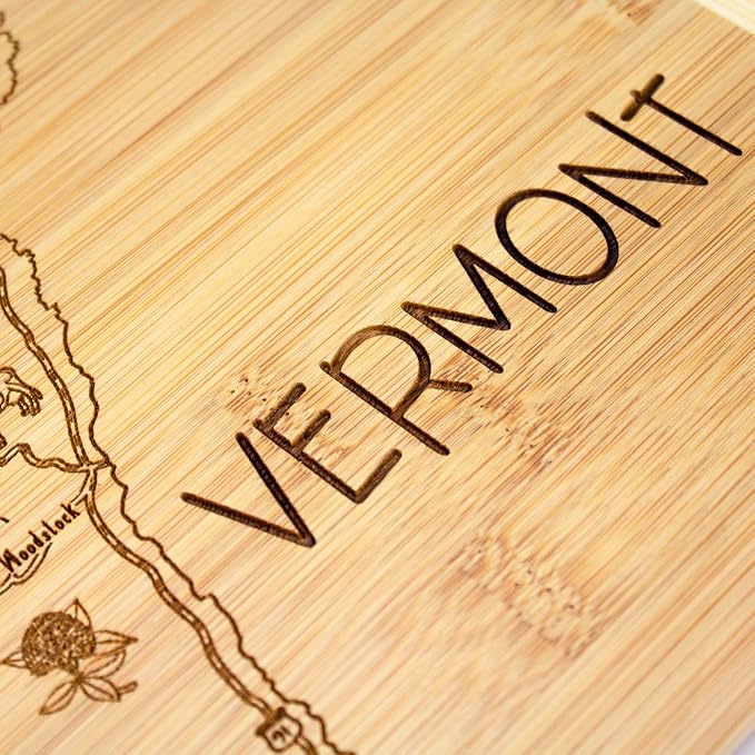 Totally Bamboo A Slice of Life Vermont Engraved Map Cutting Board | 11” x 8.75” charcuterie board with engraved state map artwork. Smooth reverse side for food prep. Hang tie for wall display.