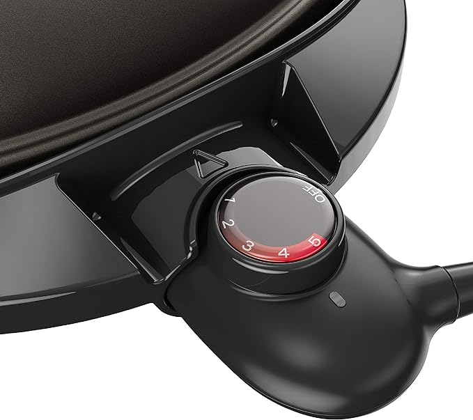 George Foreman Indoor/Outdoor Electric Grill with Stand, 15-Serving | 15-serving electric grill with removable stand, 5 heat settings and fat-removing slope for healthier grilling.
