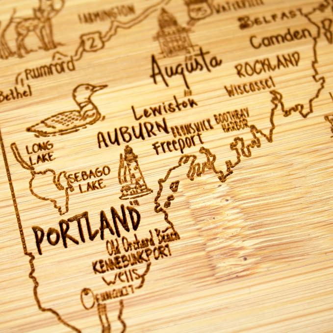 Totally Bamboo A Slice of Life Maine Engraved Map Cutting Board | 11” x 8.75” charcuterie board with engraved state map artwork. Smooth reverse side for food prep. Hang tie for wall display.