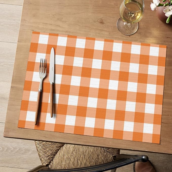 Artoid Mode Buffalo Plaid Vinyl Placemats Set of 4, 12x18 Inch Washable Non-Slip Heat Resistant Plastic Place Mats for Party Dining Table, Orange/White