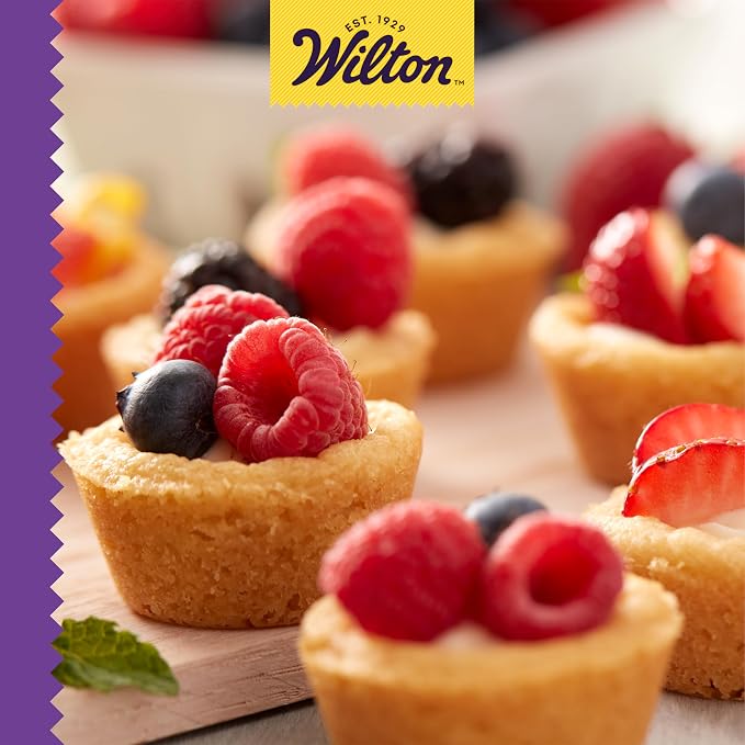Wilton Gold Non-Stick Muffin Pan, Made Without PFAS, 24-Cup | Non-Stick Steel with Scratch-Resistant Coating, Resists Warping, Extended Handles, Dishwasher Safe, Perfect for Cupcakes