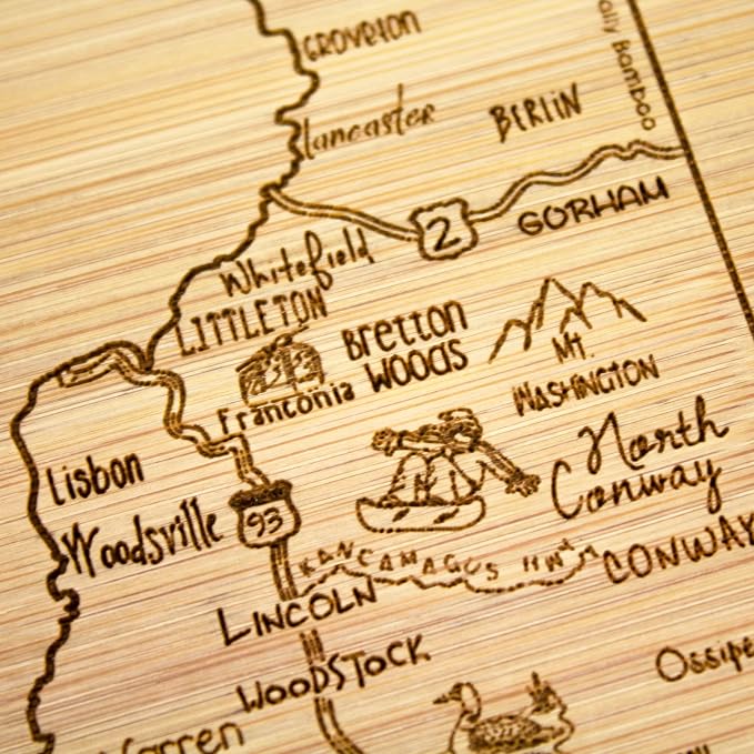 Totally Bamboo A Slice of Life New Hampshire Engraved Map Cutting Board | 11” x 8.75” charcuterie board with engraved state map artwork. Smooth reverse side for food prep. Hang tie for wall display.