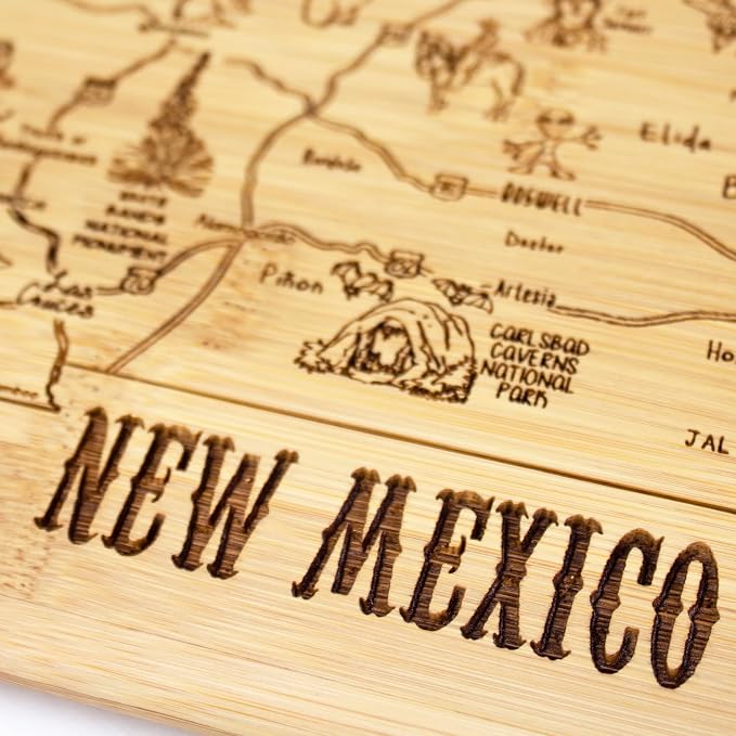 Totally Bamboo A Slice of Life New Mexico Engraved Map Cutting Board | 11” x 8.75” charcuterie board with engraved state map artwork. Smooth reverse side for food prep. Hang tie for wall display.