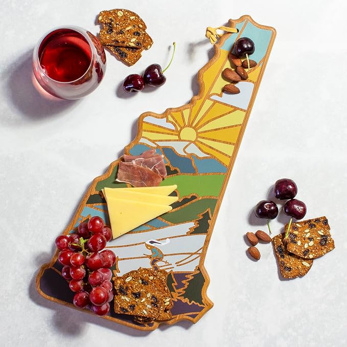 Totally Bamboo New Hampshire State Shaped Cutting Board, Summer Stokes Art | State charcuterie board with colorful hand-drawn landscape art. Smooth reverse side for food prep. Hang tie for wall display.