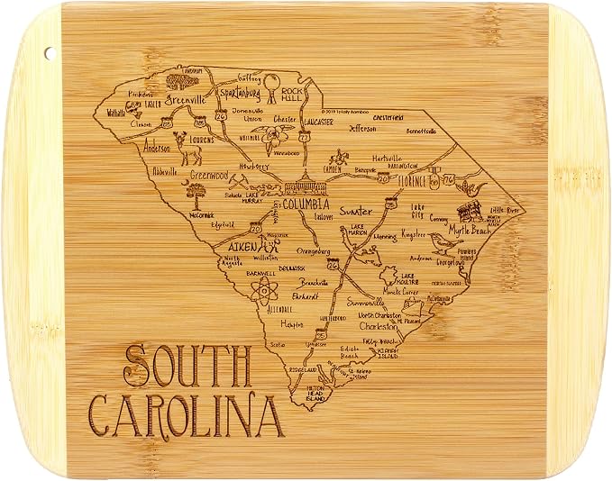 Totally Bamboo A Slice of Life South Carolina Engraved Map Cutting Board | 11” x 8.75” charcuterie board with engraved state map artwork. Smooth reverse side for food prep. Hang tie for wall display.