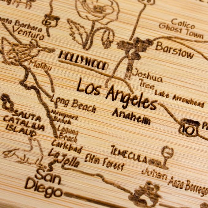 Totally Bamboo A Slice of Life California Engraved Map Cutting Board | 11” x 8.75” charcuterie board with engraved state map artwork. Smooth reverse side for food prep. Hang tie for wall display.