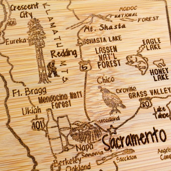Totally Bamboo A Slice of Life California Engraved Map Cutting Board | 11” x 8.75” charcuterie board with engraved state map artwork. Smooth reverse side for food prep. Hang tie for wall display.