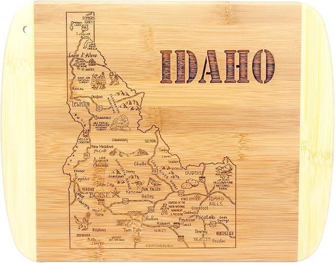 Totally Bamboo A Slice of Life Idaho Engraved Map Cutting Board | 11” x 8.75” charcuterie board with engraved state map artwork. Smooth reverse side for food prep. Hang tie for wall display.