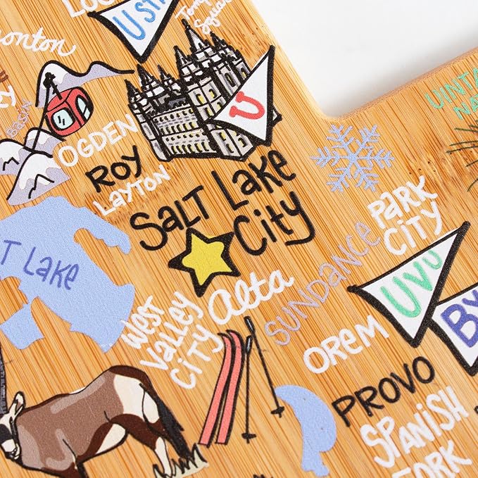 Totally Bamboo Utah State Shaped Cutting Board, Art by Fish Kiss | State charcuterie board with colorful hand-drawn map artwork. Smooth reverse side for food prep. Hang tie for wall display.