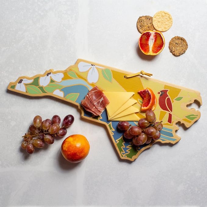Totally Bamboo North Carolina State Shaped Cutting Board, Summer Stokes Art | State charcuterie board with colorful hand-drawn landscape art. Smooth reverse side for food prep. Hang tie for wall display.