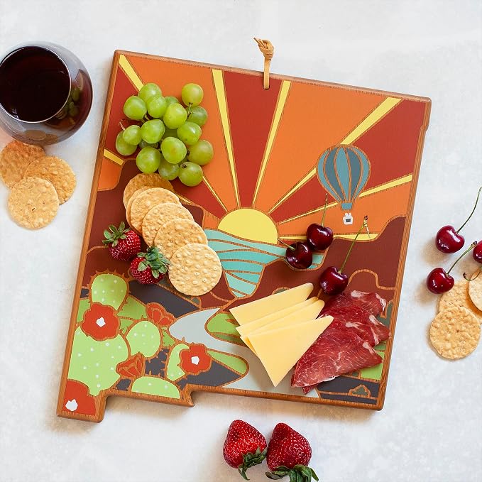 Totally Bamboo New Mexico State Shaped Cutting Board, Summer Stokes Art | State charcuterie board with colorful hand-drawn landscape art. Smooth reverse side for food prep. Hang tie for wall display.
