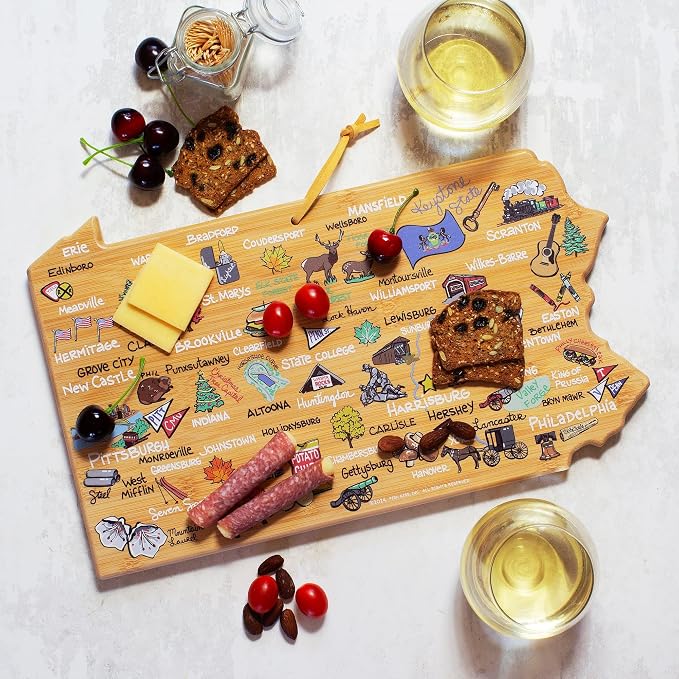 Totally Bamboo Pennsylvania State Shaped Cutting Board, Art by Fish Kiss | State charcuterie board with colorful hand-drawn map artwork. Smooth reverse side for food prep. Hang tie for wall display.