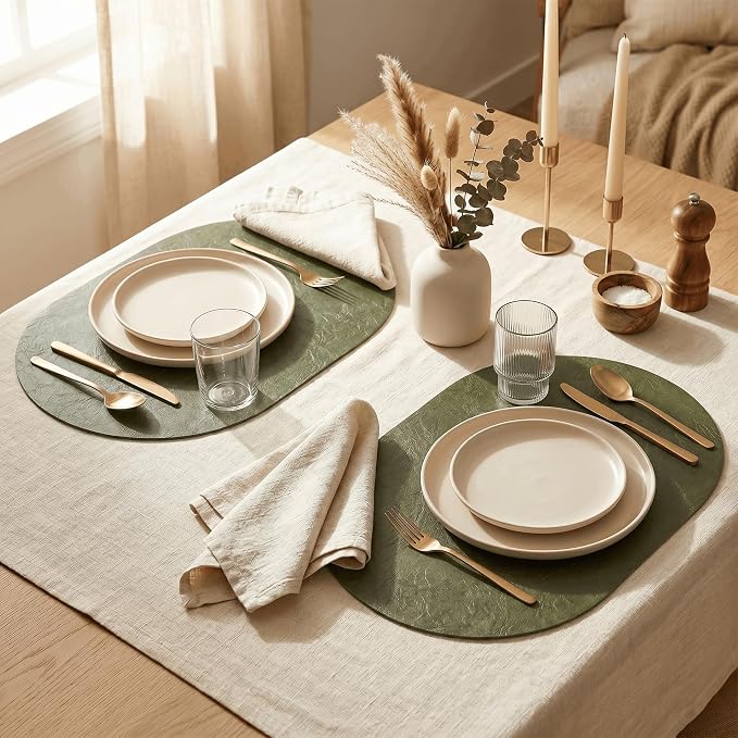 Artoid Mode Olive Green Faux Leather Oval Placemats Set of 4, 12 x 18 Inch Waterproof Wipeable Heat Resistant Vinyl Place Mats, Reversible Table Mats for Kitchen Dining Decor