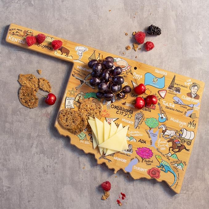 Totally Bamboo Oklahoma State Shaped Cutting Board, Art by Fish Kiss | State charcuterie board with colorful hand-drawn map artwork. Smooth reverse side for food prep. Hang tie for wall display.