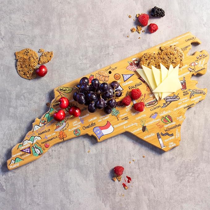 Totally Bamboo North Carolina State Shaped Cutting Board, Art by Fish Kiss | State charcuterie board with colorful hand-drawn map artwork. Smooth reverse side for food prep. Hang tie for wall display.