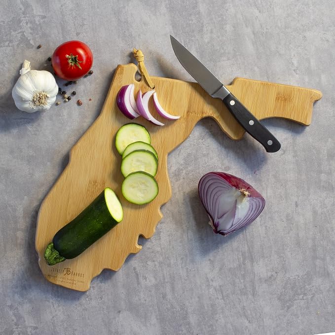 Totally Bamboo Florida State Shaped Cutting Board, Summer Stokes Art | State charcuterie board with colorful hand-drawn landscape art. Smooth reverse side for food prep. Hang tie for wall display.