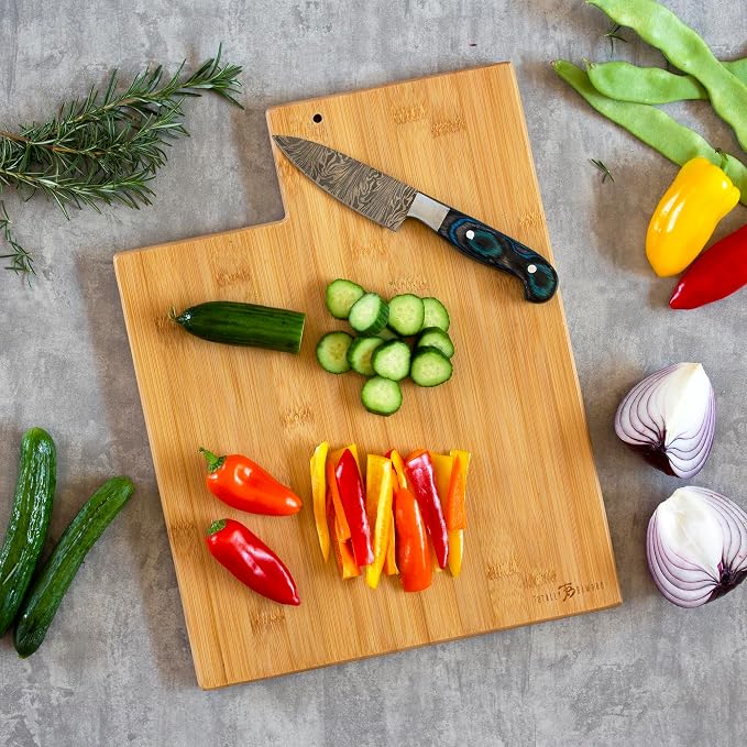 Totally Bamboo Utah State Shaped Cutting Board, Art by Fish Kiss | State charcuterie board with colorful hand-drawn map artwork. Smooth reverse side for food prep. Hang tie for wall display.