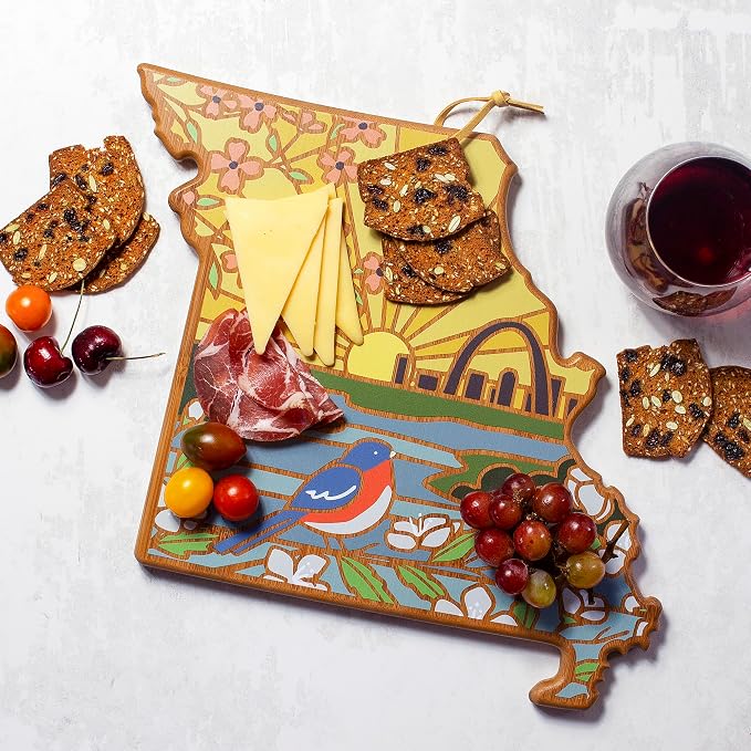 Totally Bamboo Missouri State Shaped Cutting Board, Summer Stokes Art | State charcuterie board with colorful hand-drawn landscape art. Smooth reverse side for food prep. Hang tie for wall display.