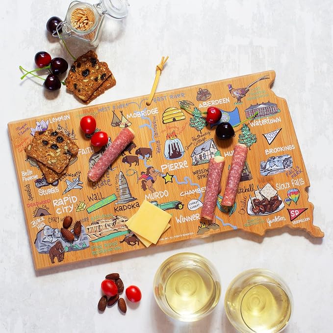 Totally Bamboo South Dakota State Shaped Cutting Board, Art by Fish Kiss | State charcuterie board with colorful hand-drawn map artwork. Smooth reverse side for food prep. Hang tie for wall display.