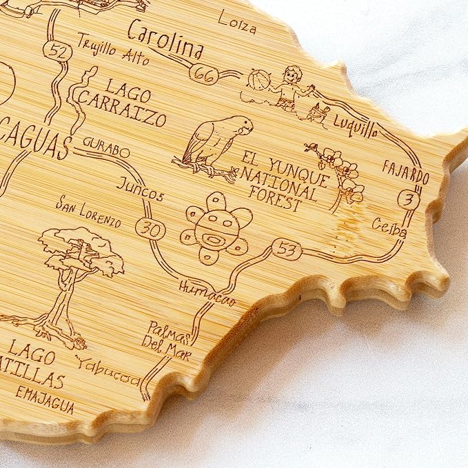 Totally Bamboo Destination Puerto Rico Cutting Board with Engraved Map Art | Puerto Rico shaped charcuterie board with engraved map art. Smooth back for food prep. Hang tie for wall display.