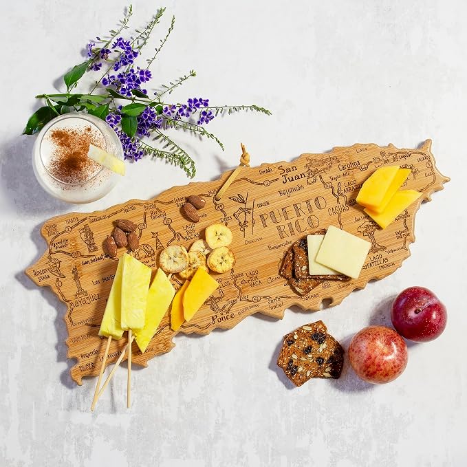 Totally Bamboo Destination Puerto Rico Cutting Board with Engraved Map Art | Puerto Rico shaped charcuterie board with engraved map art. Smooth back for food prep. Hang tie for wall display.