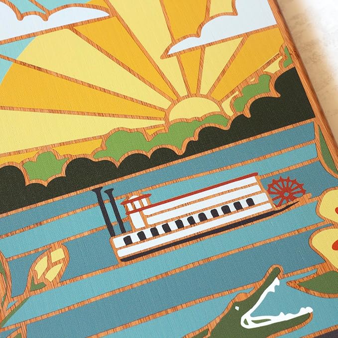 Totally Bamboo Mississippi State Shaped Cutting Board, Summer Stokes Art | State charcuterie board with colorful hand-drawn landscape art. Smooth reverse side for food prep. Hang tie for wall display.