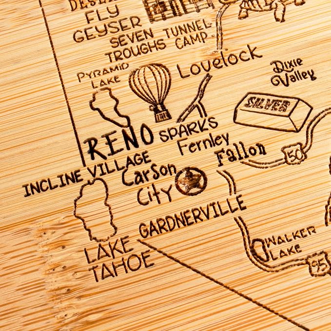 Totally Bamboo A Slice of Life Nevada Engraved Map Cutting Board | 11” x 8.75” charcuterie board with engraved state map artwork. Smooth reverse side for food prep. Hang tie for wall display.
