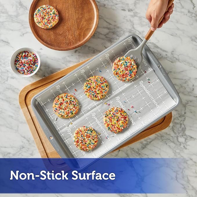 Reynolds Kitchens Parchment Baking Sheets, 25 Sheets (Pack of 4), 100 Total | Pre-cut parchment cookie baking sheets, Non-stick, Smart-grid lines for even spacing of cookies, Use up to 3 times