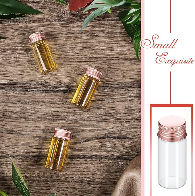 Didaey 100 Pcs Small Clear Vials Spice Mini Jars with Lids Mini Glass Bottles with Screw Aluminum Metal Caps Tiny Jars Sample Containers for Powder Cream Cosmetic Jewelry Wedding (10 ml,Rose Gold)