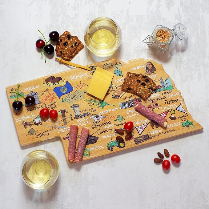 Totally Bamboo Nebraska State Shaped Cutting Board, Art by Fish Kiss | State charcuterie board with colorful hand-drawn map artwork. Smooth reverse side for food prep. Hang tie for wall display.