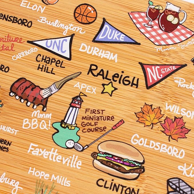 Totally Bamboo North Carolina State Shaped Cutting Board, Art by Fish Kiss | State charcuterie board with colorful hand-drawn map artwork. Smooth reverse side for food prep. Hang tie for wall display.