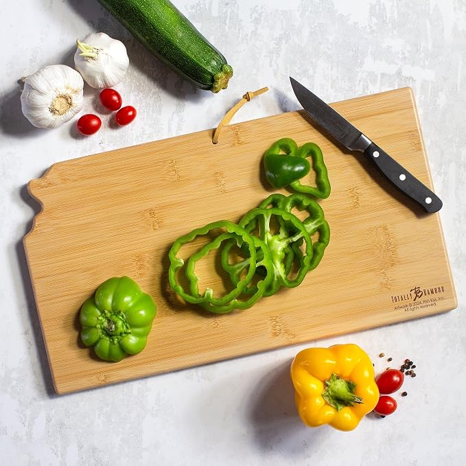 Totally Bamboo Kansas State Shaped Cutting Board, Art by Fish Kiss | State charcuterie board with colorful hand-drawn map artwork. Smooth reverse side for food prep. Hang tie for wall display.