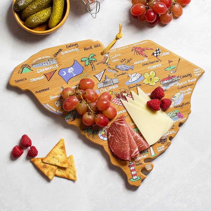Totally Bamboo South Carolina State Shaped Cutting Board, Art by Fish Kiss | State charcuterie board with colorful hand-drawn map artwork. Smooth reverse side for food prep. Hang tie for wall display.
