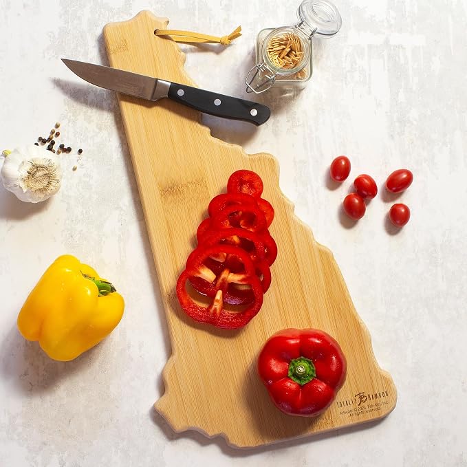 Totally Bamboo New Hampshire State Shaped Cutting Board, Art by Fish Kiss | State charcuterie board with colorful hand-drawn map artwork. Smooth reverse side for food prep. Hang tie for wall display.
