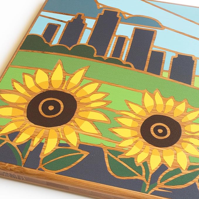 Totally Bamboo Kansas State Shaped Cutting Board, Summer Stokes Art | State charcuterie board with colorful hand-drawn landscape art. Smooth reverse side for food prep. Hang tie for wall display.