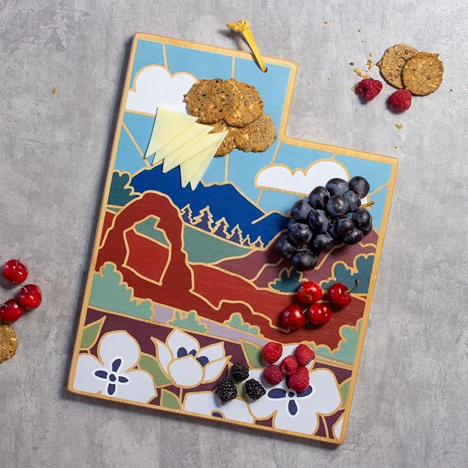 Totally Bamboo Utah State Shaped Cutting Board, Summer Stokes Art | State charcuterie board with colorful hand-drawn landscape art. Smooth reverse side for food prep. Hang tie for wall display.