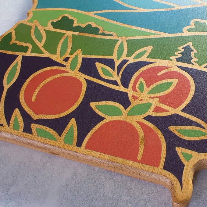 Totally Bamboo Georgia State Shaped Cutting Board, Summer Stokes Art | State charcuterie board with colorful hand-drawn landscape art. Smooth reverse side for food prep. Hang tie for wall display.