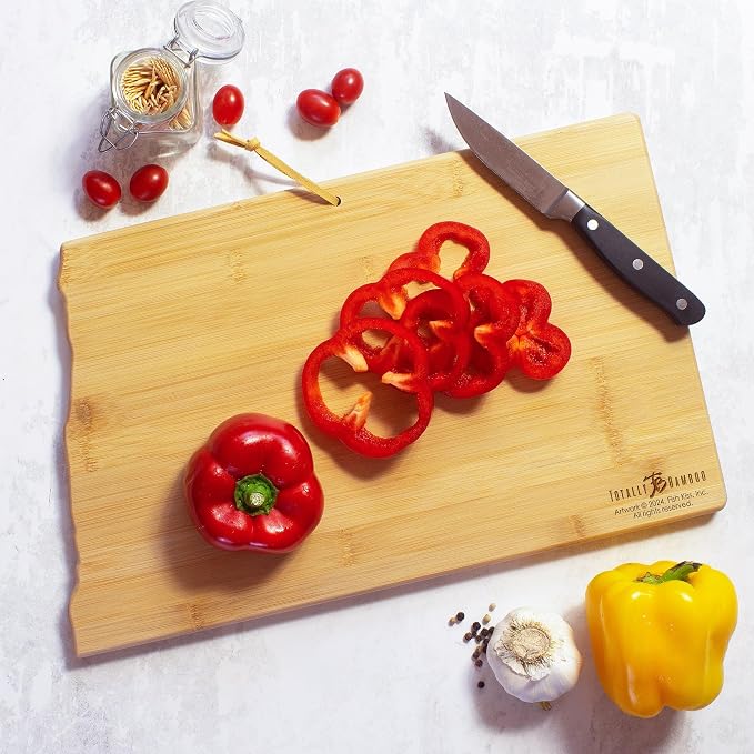 Totally Bamboo North Dakota State Shaped Cutting Board, Art by Fish Kiss | State charcuterie board with colorful hand-drawn map artwork. Smooth reverse side for food prep. Hang tie for wall display.