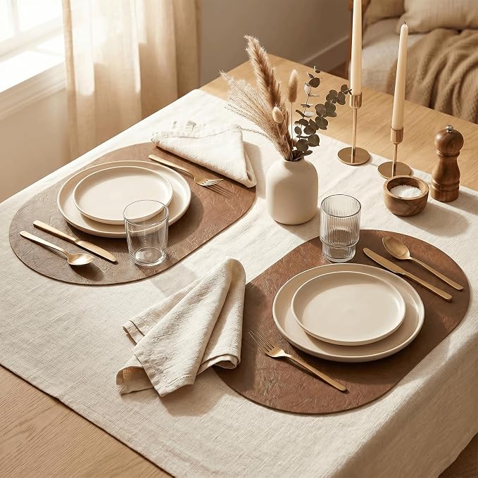 Artoid Mode Brown Faux Leather Oval Placemats Set of 6, 12 x 18 Inch Waterproof Wipeable Heat Resistant Vinyl Place Mats, Reversible Table Mats for Kitchen Dining Decor